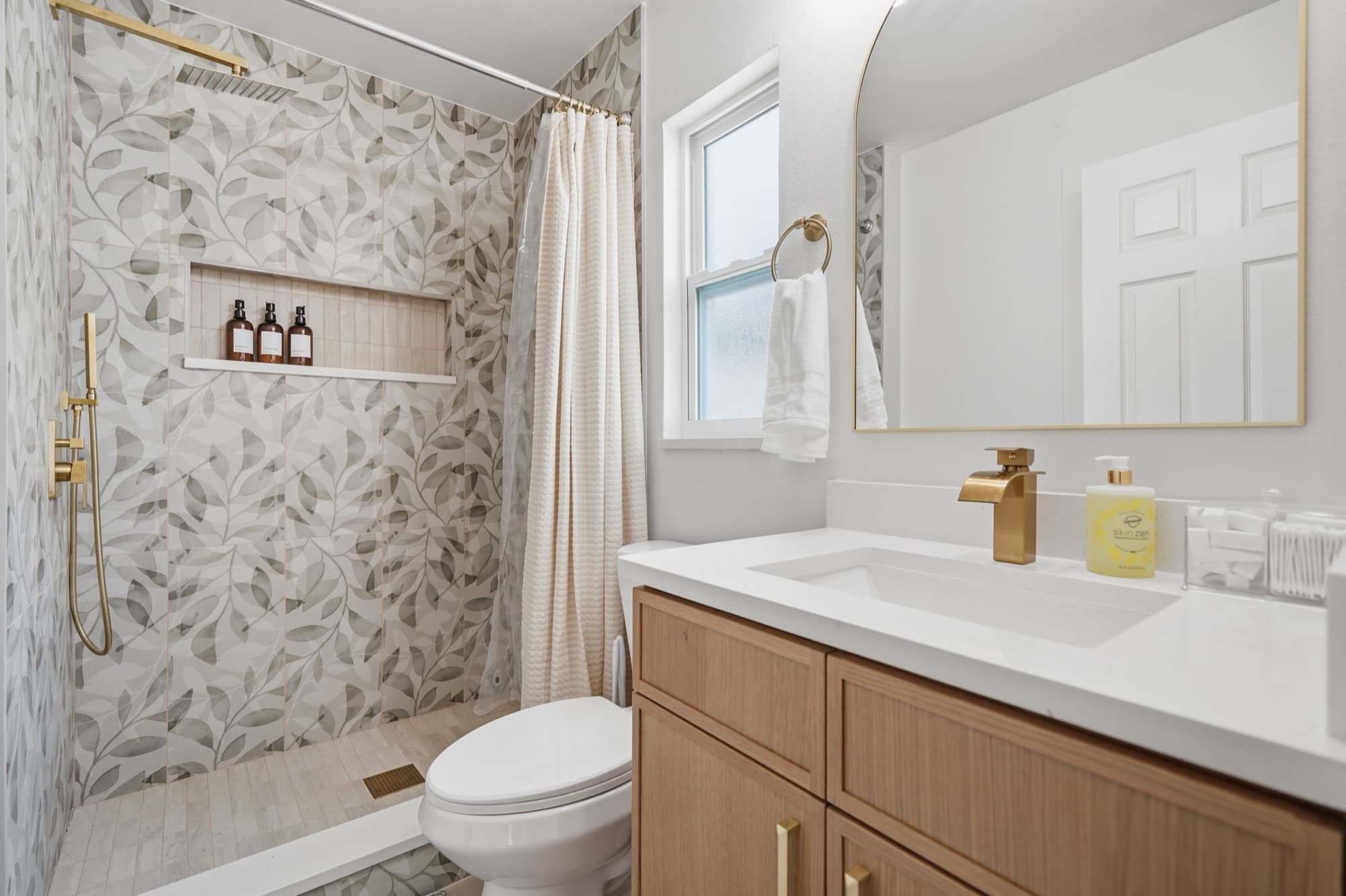 En-suite bathroom with walk-in rainfall shower